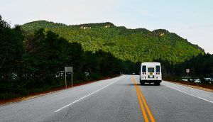 Highway through the White Mountains in New Hampshire with a camper van